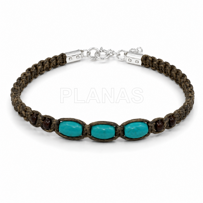 Pulsera en plata de ley y semillas color turquesa.