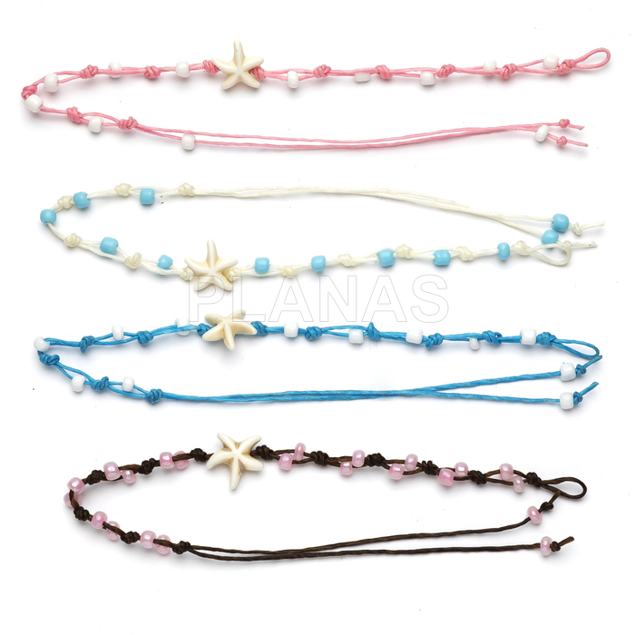 Pulseiras ou tornozeleiras com fio encerado resistente à água. estrela-do-mar.