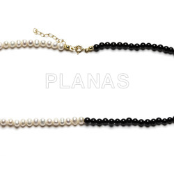 Necklace in sterling silver and gold plated with cultured pearls and onyx.